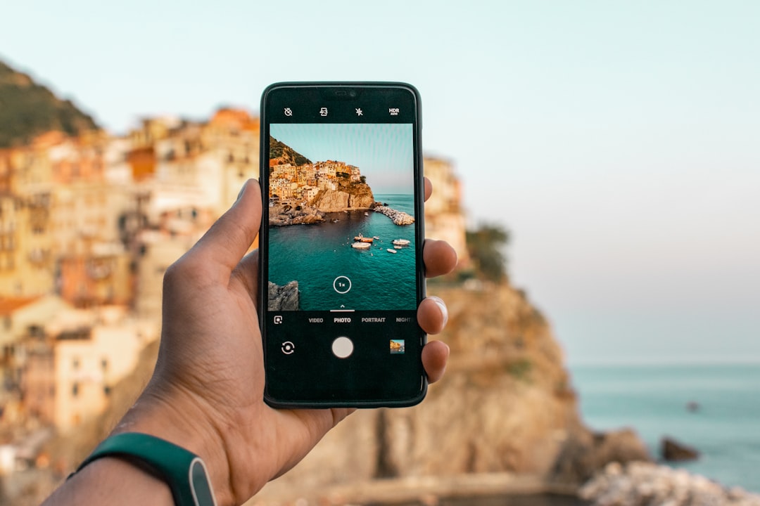 Smartphone being set up for travel mobile data