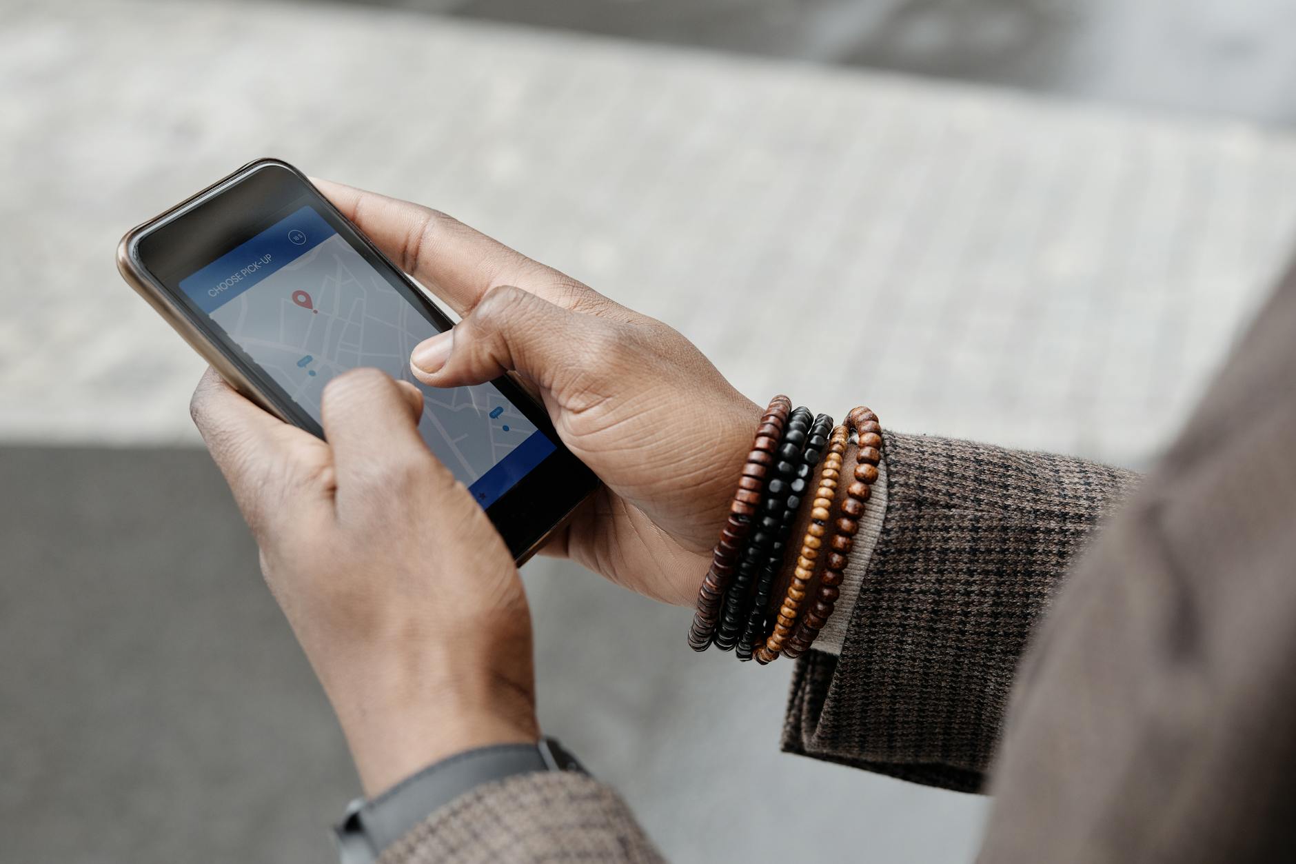 Traveller using a smartphone map while overseas