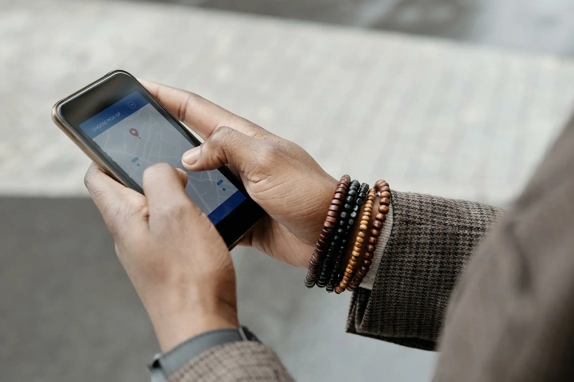 Traveller using a smartphone map while overseas