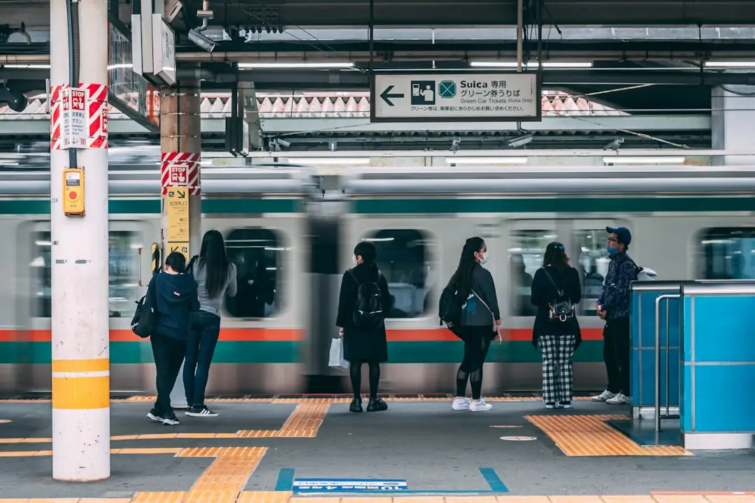 A Tokyo train station platform with travellers