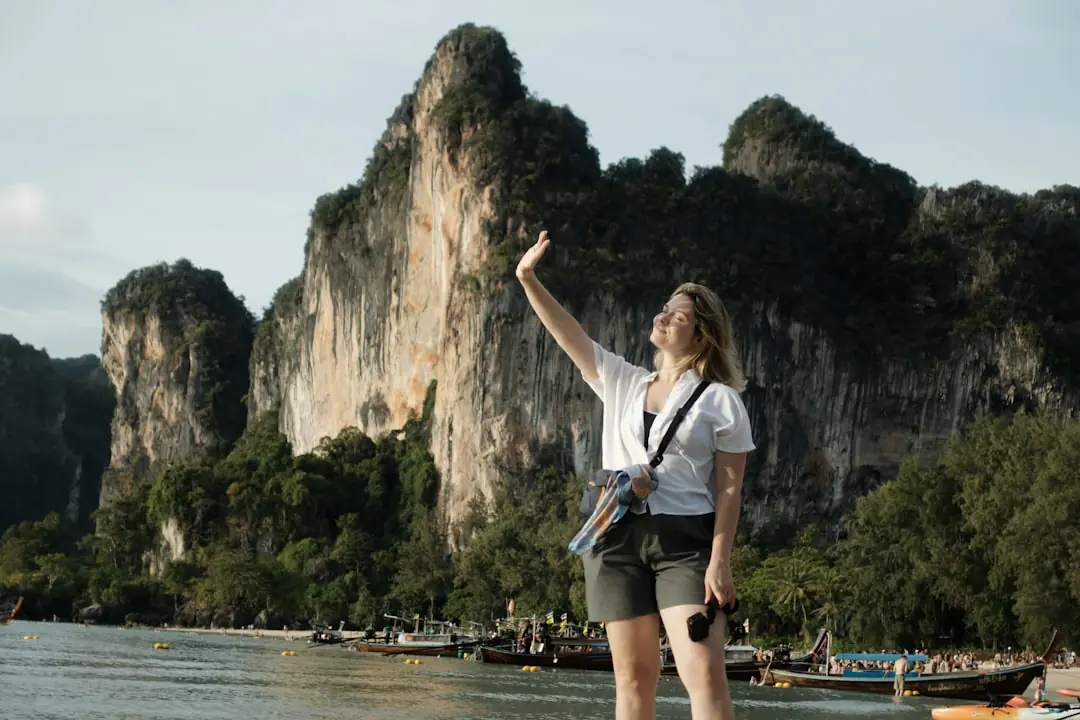 Traveller using a phone to book transport in Southeast Asia